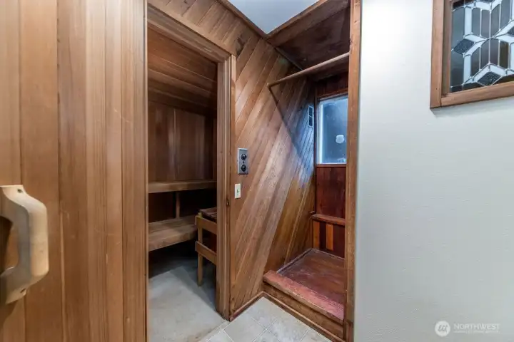 Beautiful cedar sauna that easily seats 6 provides a spa experience right at home!