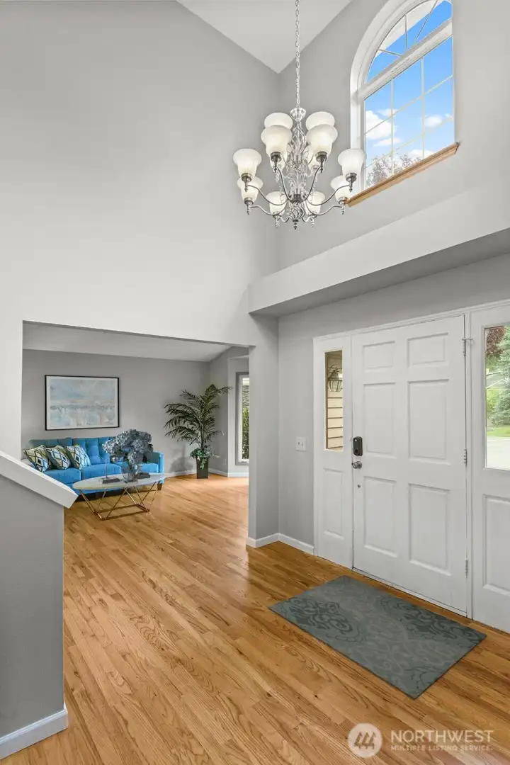 Soaring ceilings and beautiful lighting in the entry