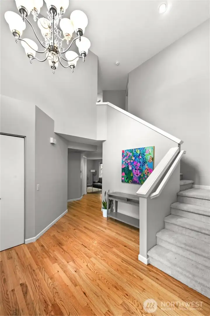 Stunning hardwood flooring creates a warm welcome.
