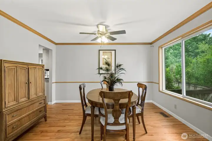 Formal dining room with an abundance of natural light