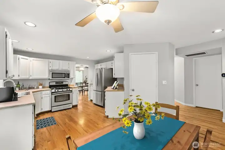Kitchen with walk-in pantry and casual dining area - open to the family room