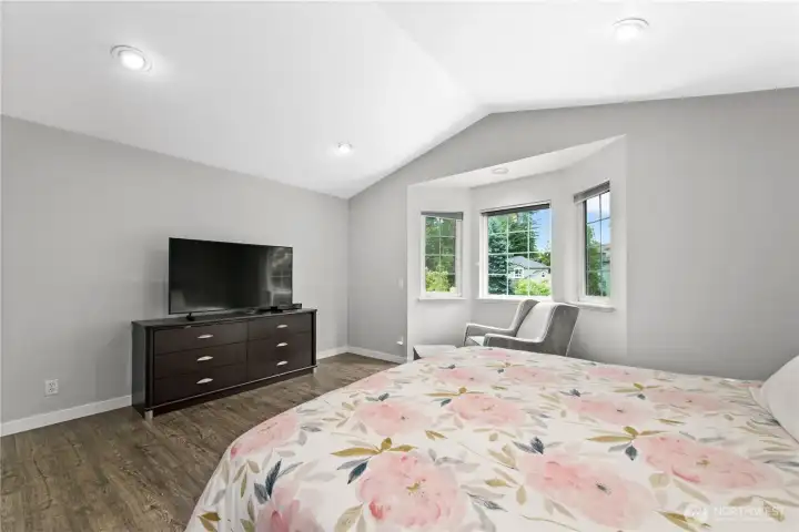 Primary suite with bay window. Wonderful area to relax.