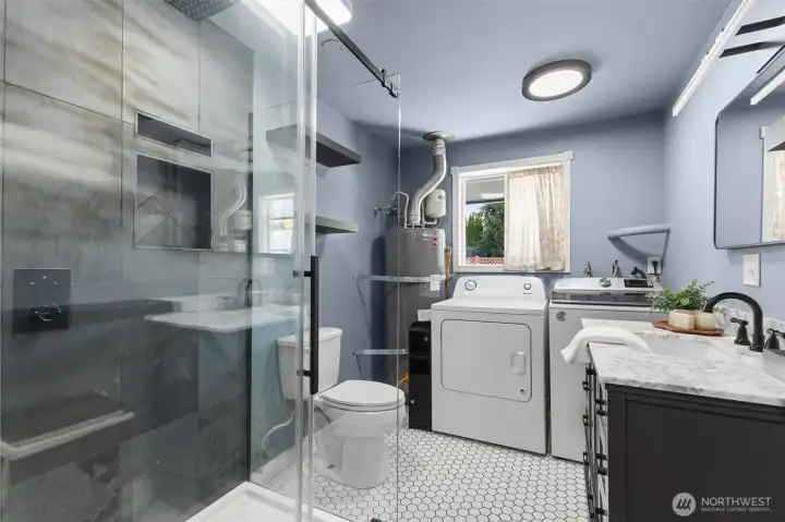 second bathroom with walk-in shower and laundry area. second bathroom with walk-in shower and laundry area.