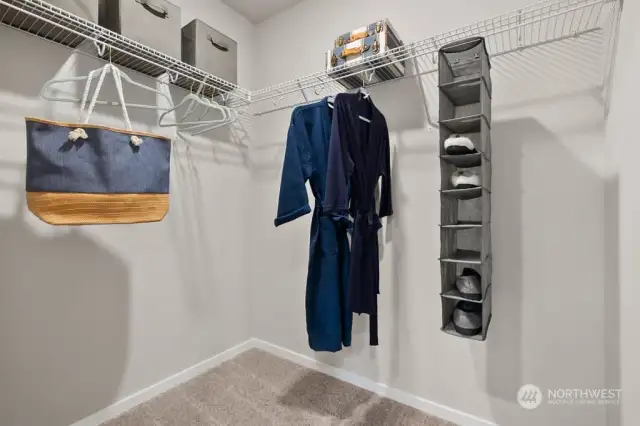 Primary closet-Photos are for representational purposes only, colors and features may vary.