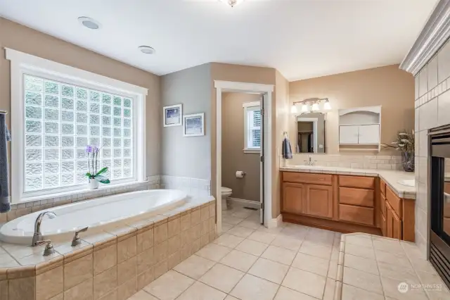Great double sink layout. Imagine soaking in the tub enjoying the fire on a cold night.