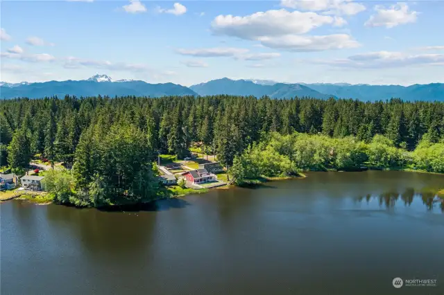 The Olympic Mountain Range serves as a stunning backdrop for your new beach house on the lake! Enjoy the tranquility.