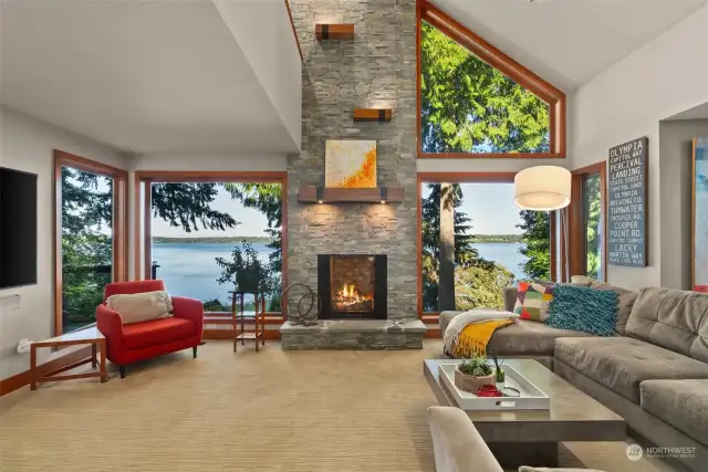 Spacious living room w/ vaulted ceilings, custom stone fireplace and VIEWS!