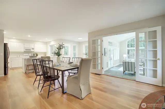 Kitchen, eating nook, and family or dining room. A great room effect.