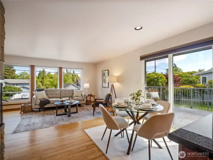 Refinished hardwoods throughout the living & dining rooms plus floor to ceiling windows letting the natural light pour in.