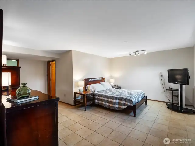 The downstairs area has been regularly rented below market value at $1,000 a month; large bedroom/living room area, 3/4 bath, and kitchen w/eating nook. Tenant had access through the garage.