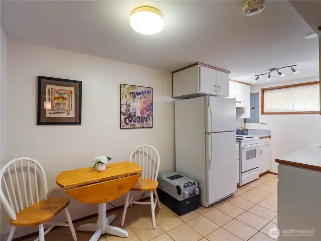 Lower level kitchenette with eating nook.