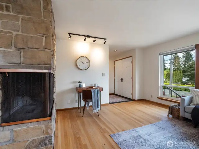 Double door entry with slate flooring greet you as you step in to this beautiful MCM home.