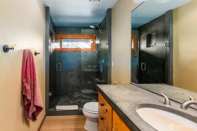 Bath in living space above garage