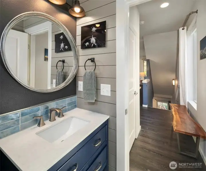 Fully remodeled main floor powder room.