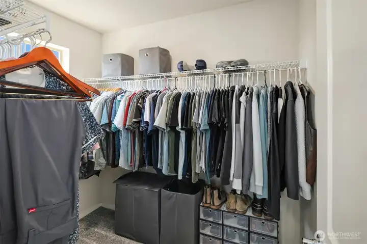 Spacious walk-in closet in primary.