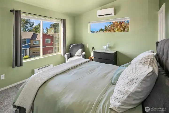 Second upper floor bedroom gets plenty of western light. Note mini-split #3.