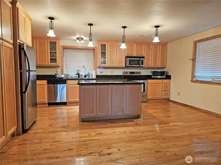 The true gem of this home is the kitchen! Well lit, lots of built in counter space, a large central island, and room for lots more!
