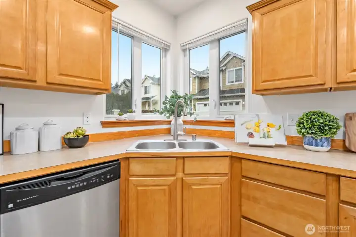 Extensive recessed lighting and dual windows provide optimal light in this space.