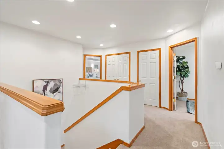 A wide staircase leads you to the upstairs landing. To the left of the landing is the bonus room/den, a storage closet, double-door linen closet and at the end of the hallway is the primary bedroom suite.