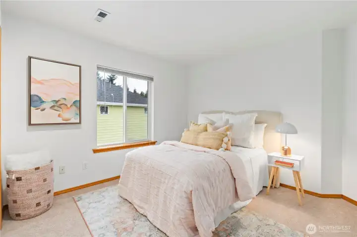 At the end of the hallway is Bedroom #3 also embellished with new carpeting, fresh interior paint and dimmer lighting.