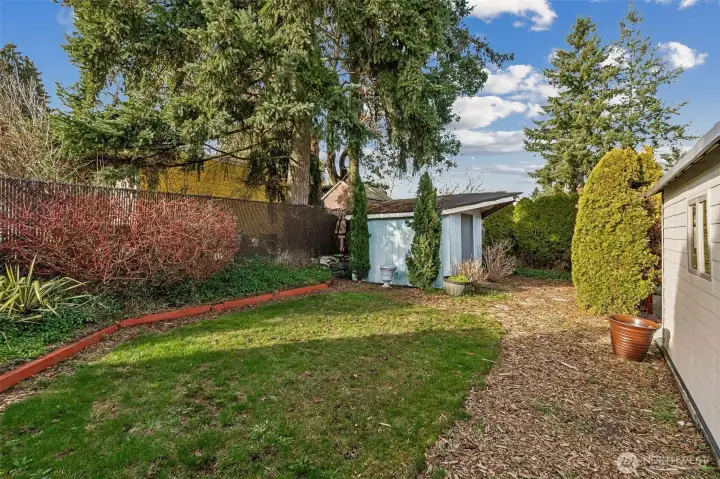 Private back yard and garden shed.