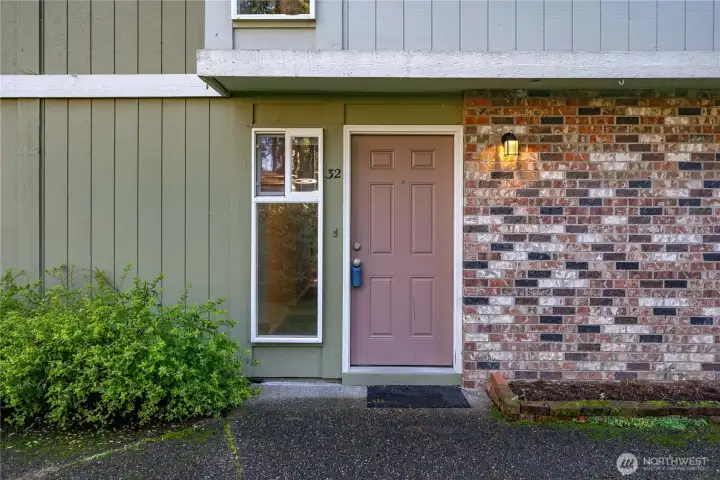 The front door entry is welcoming and well lit.