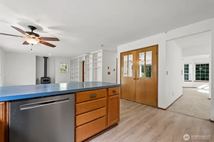 Kitchen looking through to dining room and family room.