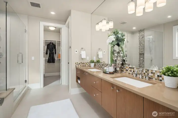 Ensuite bath with double vanity offering plenty of storage space