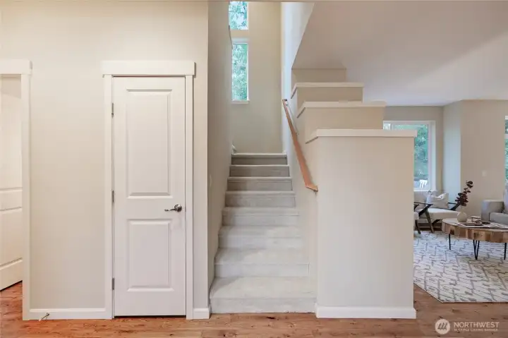 Be sure to check out the large storage area inside this closet! It goes around the corner, under the stairs.