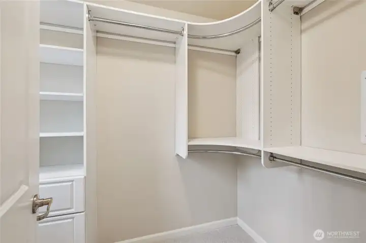 Custom shelving in the primary bedroom walk in closet.