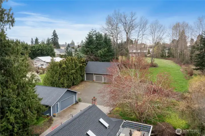 Detached 24x30 finished garage with 24x36 shop on over two acres.