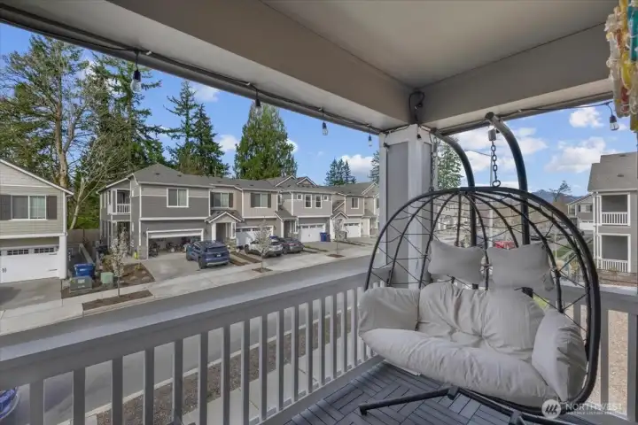 Deck off the upstairs bonus room. Mountain views on the right.
