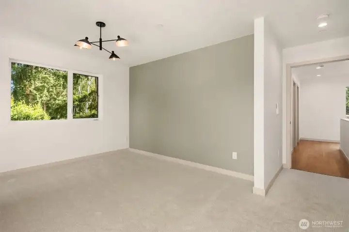 Primary Suite with Ensuite Bathroom and Spacious Walk-in Closet