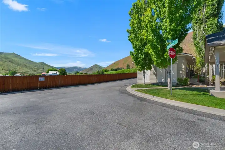 Wide streets, manicured grounds, and surrounding natural scenery create a welcoming environment while remaining conveniently close to downtown amenities, healthcare, shopping, and recreation.