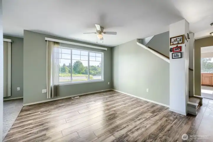 Behind the photographer is a wall of closets and a half bath - no shortage of storage in this house!