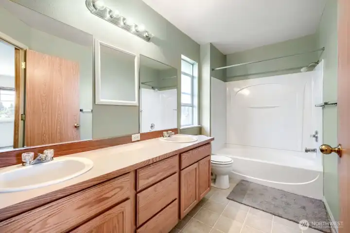 Dual sinks in the primary bathroom.