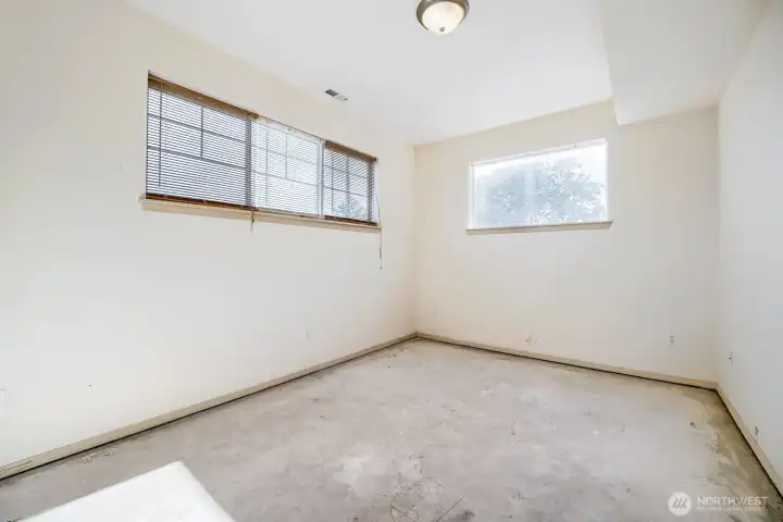 Main level bonus room - great for media, work, guests, or hobbies!