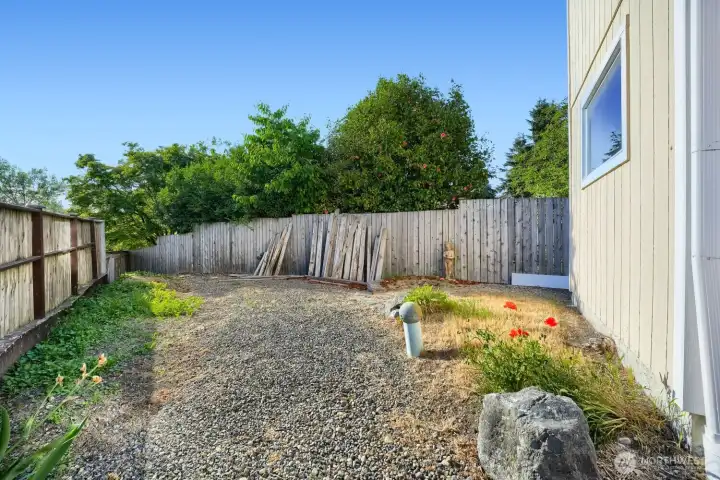 Low maintenance yard with space for garden beds!