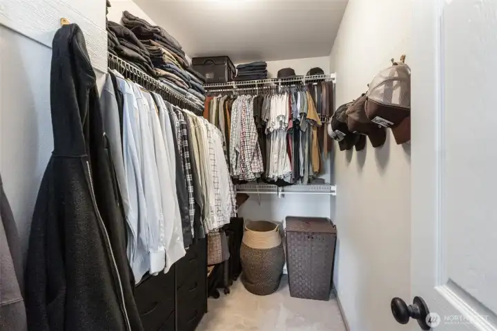 Primary bedroom closet. Primary bedroom closet.