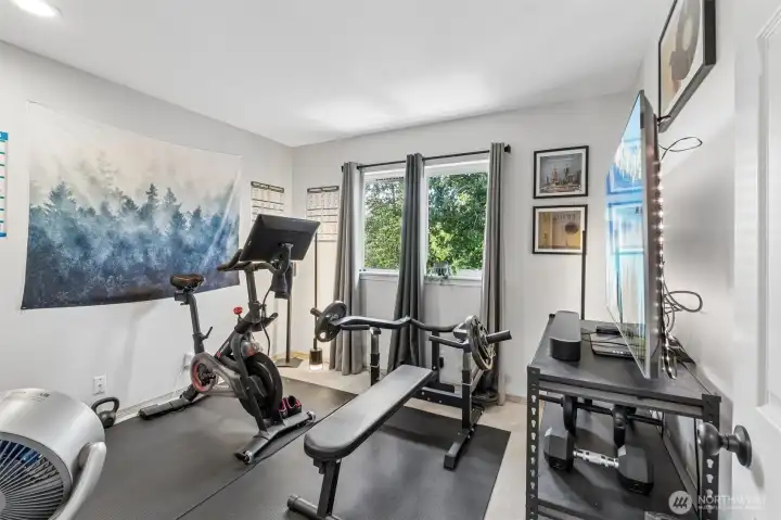 Flexible third bedroom well-suited for a home gym, guest space, or creative use. Flexible third bedroom well-suited for a home gym, guest space, or creative use.