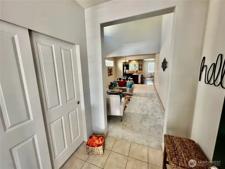 View from the front door...The entry offers easy care tile floor and ample guest closet space. View from the front door...The entry offers easy care tile floor and ample guest closet space.