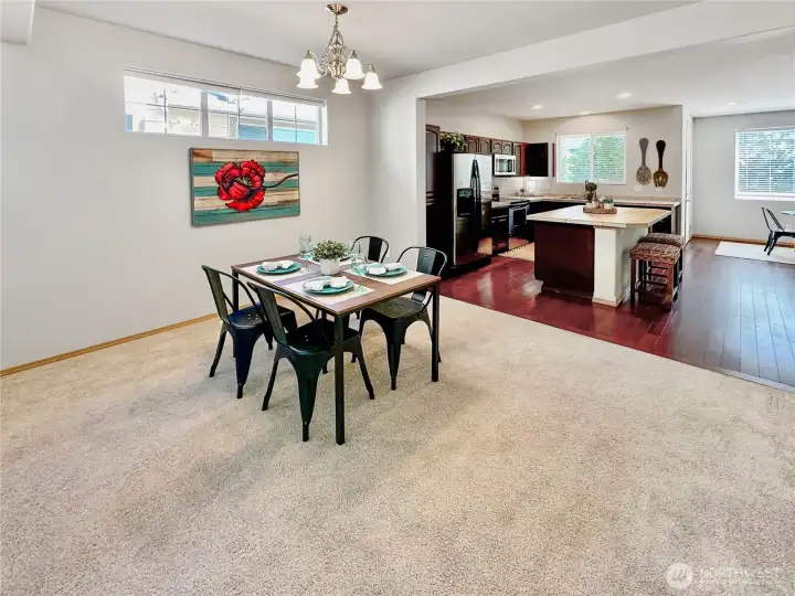 Spacious dining area with easy access to the kitchen and clerestory windows. Spacious dining area with easy access to the kitchen and clerestory windows.