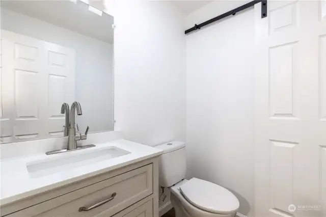 Hall ½ Bath  Undermount sink / toilet  Closet (pantry/linen closet) with barn door closing and interior lighting plus custom shelving  Lutron Maestro (motion sensing switch)