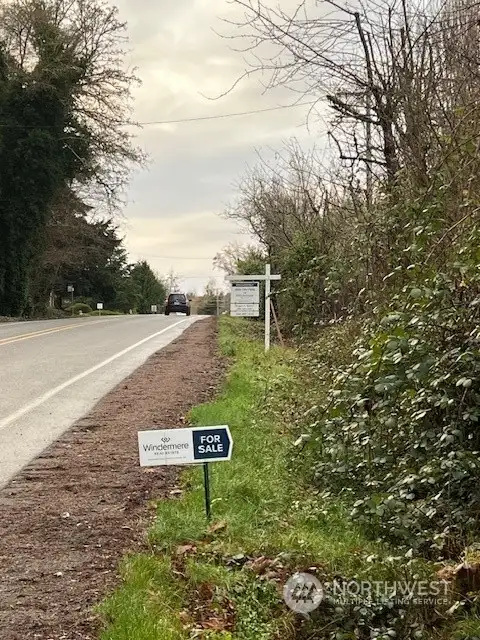 Turn right before signs, and look for sign to lot on the left.  Ok to park in grassy area.  Please do not block neighbors driveway.