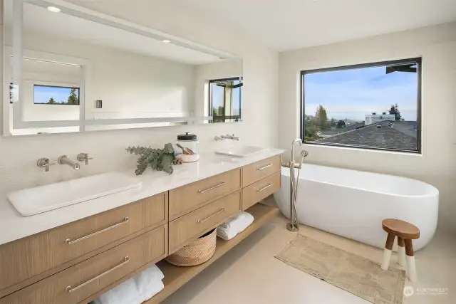 Primary bath showing Juliette tub. This room also has a large steam shower not pictured.