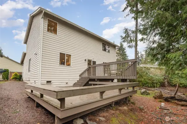 Two-Story Deck Overlooking Green Space