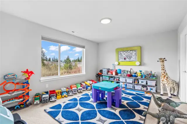Bedroom/Playroom includes it's own private ensuite bath.