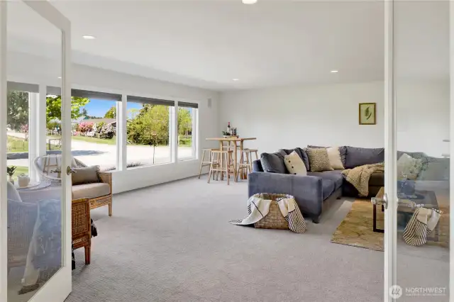 This huge family room comes complete with french doors so it can separated from the living room. Note the NEW carpet!