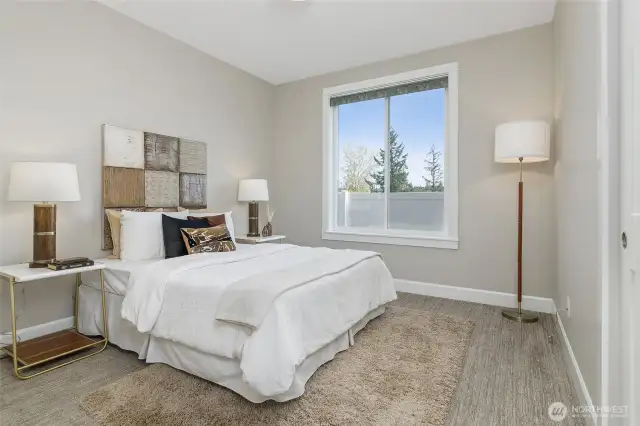 The two generously sized bedrooms, currently showcasing queen beds, offer the flexibility to easily accommodate king-size beds or even two full-size beds in one room.