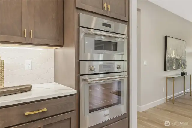 Cooking is a breeze with the included Thermador ovens and microwave, offering versatility for any culinary preference with gas, electric, and convection options.